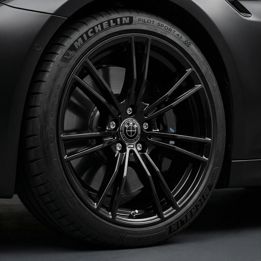 4 Stk. 50 års jubilæum BMW Centerkapsler i sort med hvide detaljer