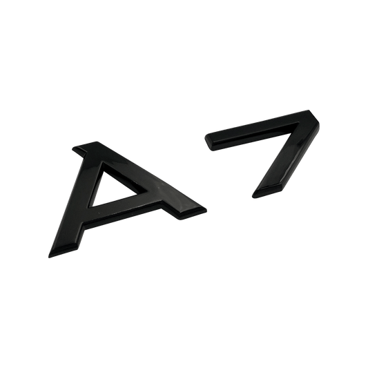 Svart Audi A7-emblem